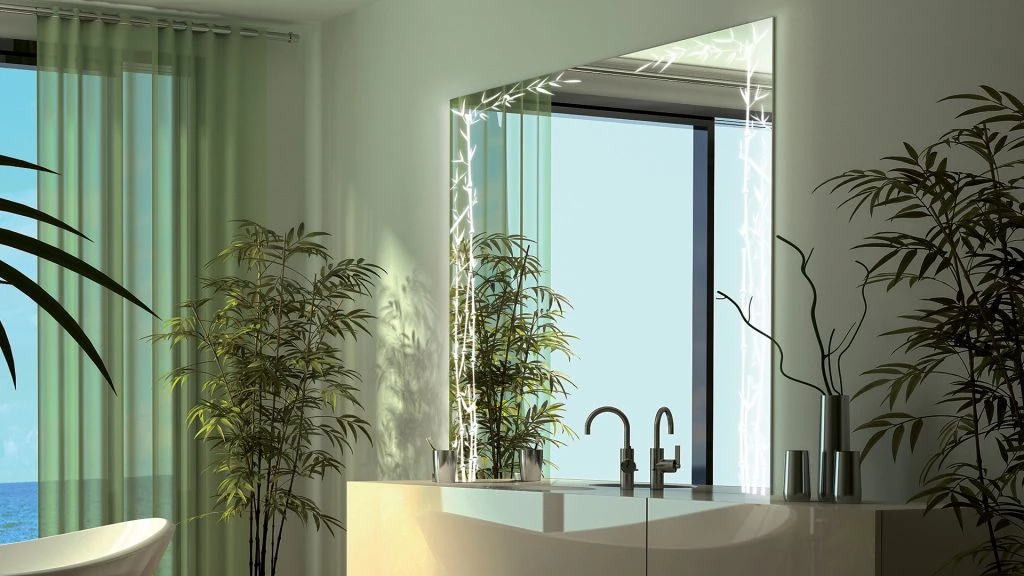 Bathroom mirrors with a bamboo design light frame and a tiled sink in a cozy bathroom in Abu Dhabi.