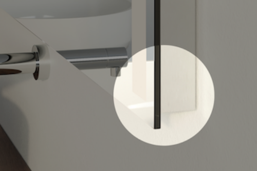 Thinnest energy efficient mirror with one to two inches depth on a white concrete wall within Ajman.